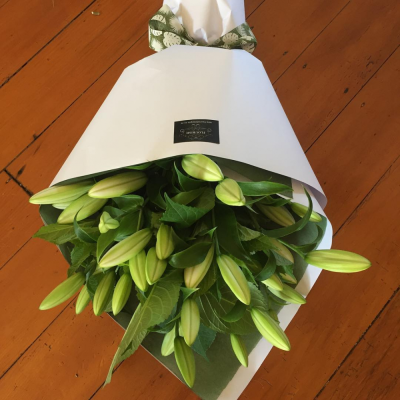 White lily bouquet - A beautiful bouquet of white oriental lilies and greenery wrapped in white paper - an all time favourite!