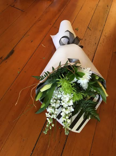 Classic Grace - A fresh and elegant bouquet combining crisp white and green tones with lush foliage. Beautifully wrapped and presented, this timeless design is perfect for birthdays, thank-yous, congratulations or simply showing someone you care.