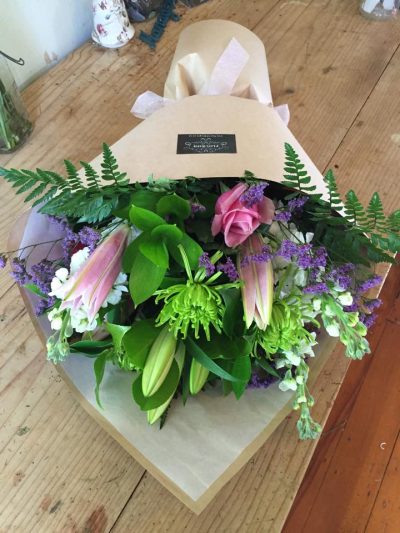 Vintage Garden - A generous hand-tied bouquet combining soft romantic shades with fresh green tones and delicate touches of colour. Its relaxed, garden-inspired style makes it a beautiful gift for birthdays, anniversaries or simply to brighten someone’s day.