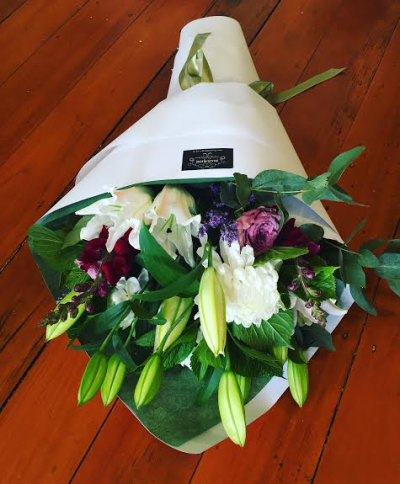 Timeless Beauty - A beautifully presented bouquet in soft, elegant shades with fresh greenery and contrasting deeper tones. Stylishly wrapped, this generous design makes a wonderful gift for birthdays, anniversaries, celebrations or simply to show you care.